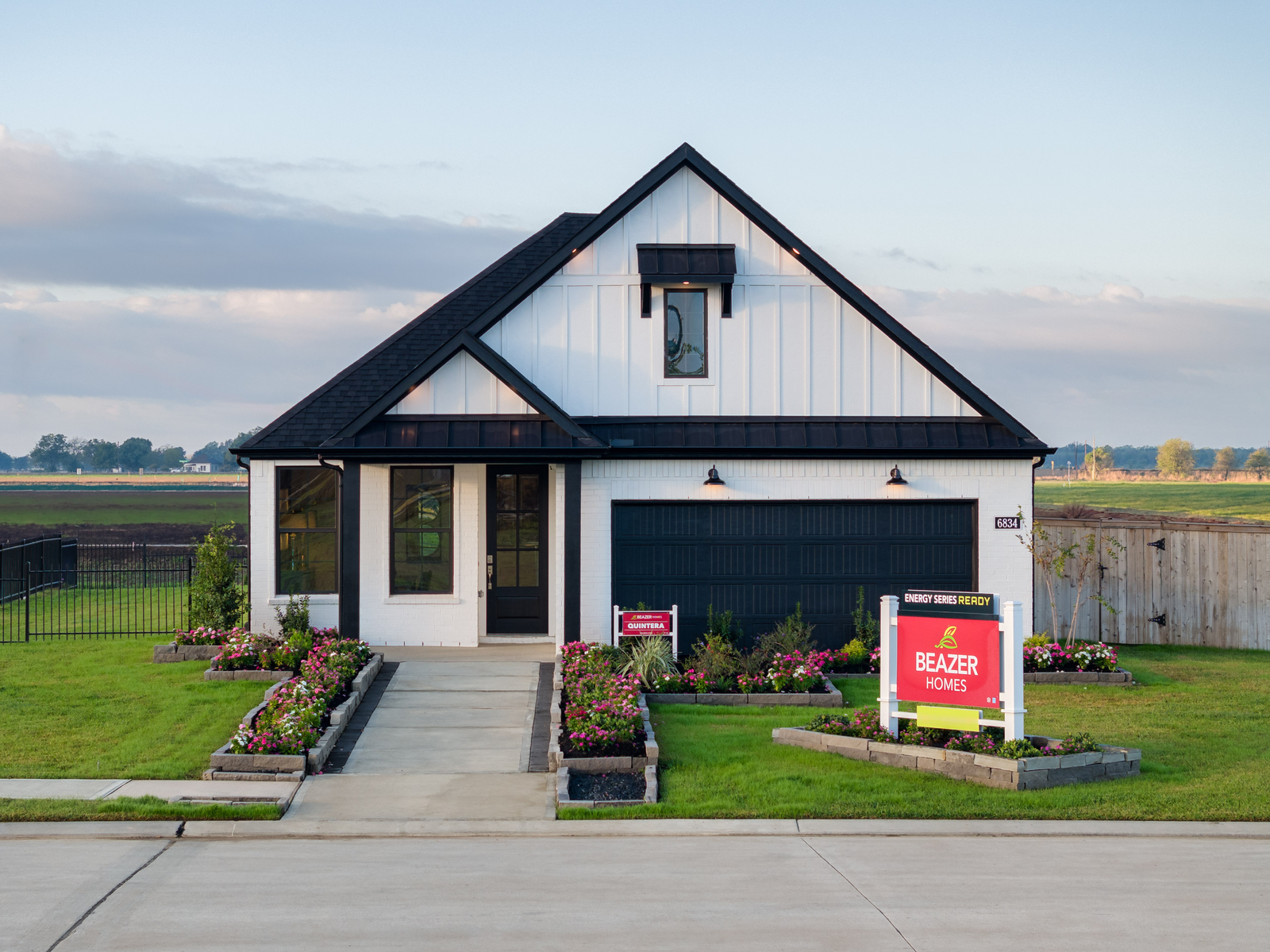 black and white exterior with black framed windows