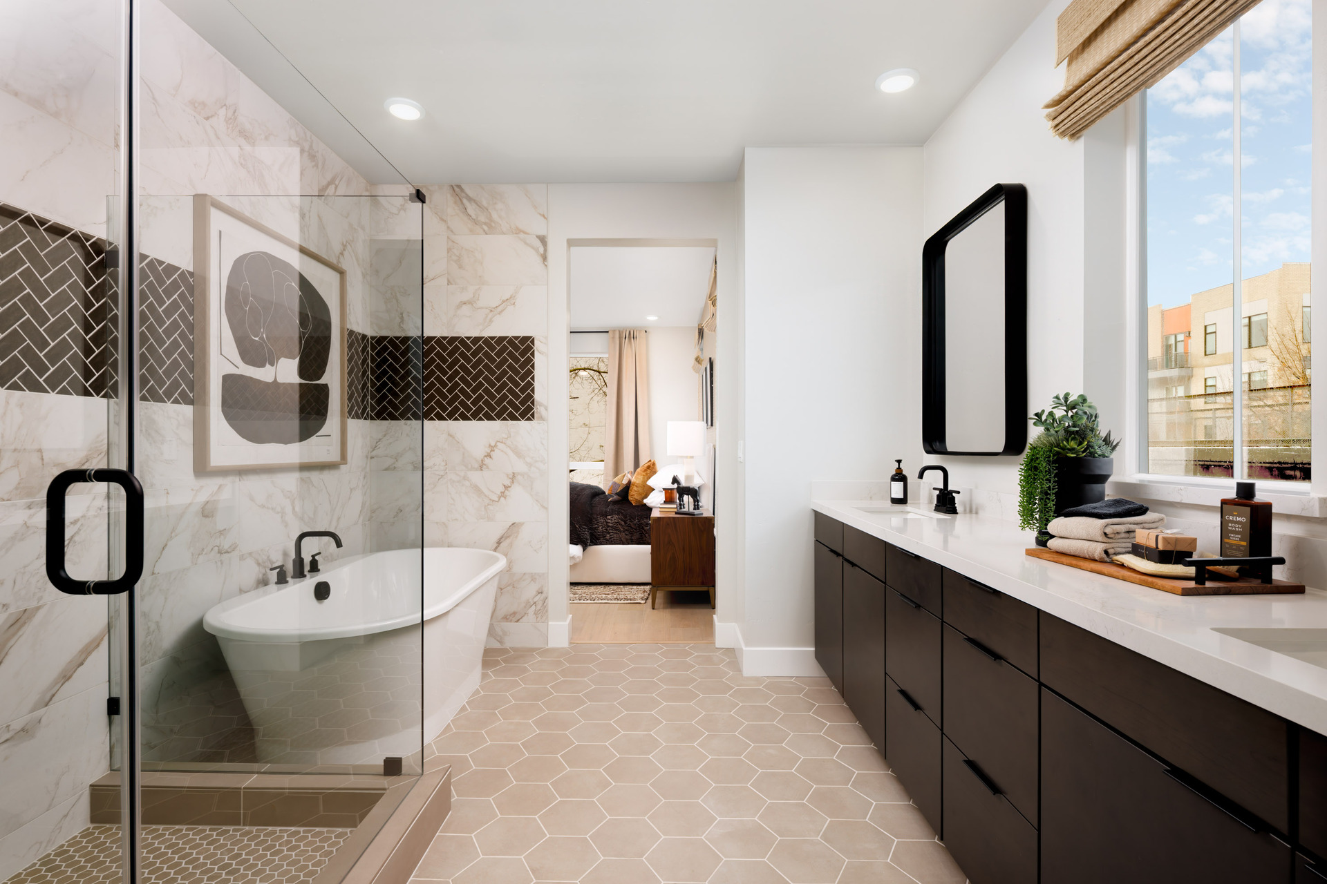bathroom with freestanding tub, espresso cabinets, white counters, tan tile floors, and walk-in shower