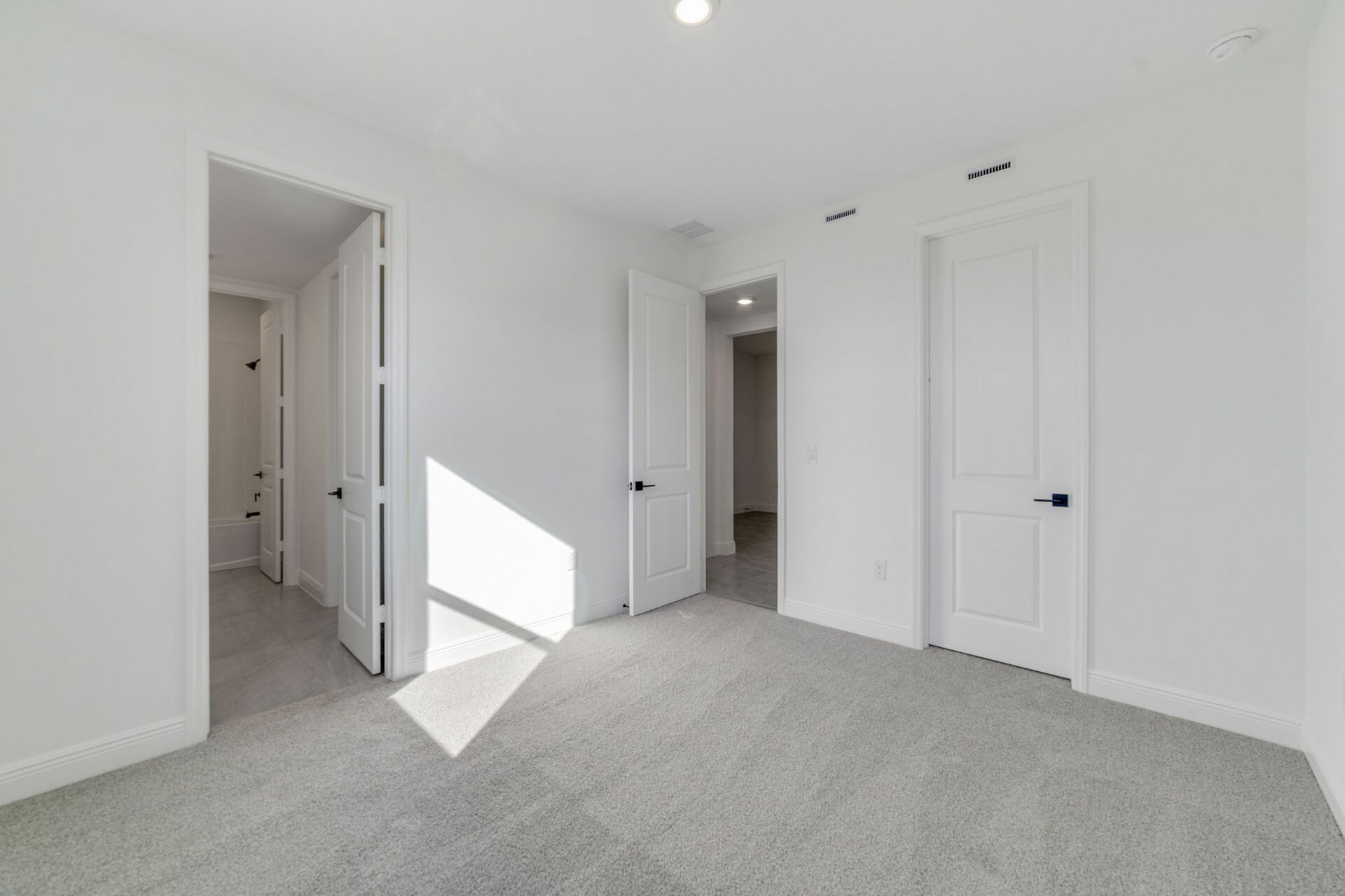 carpet throughout with large window