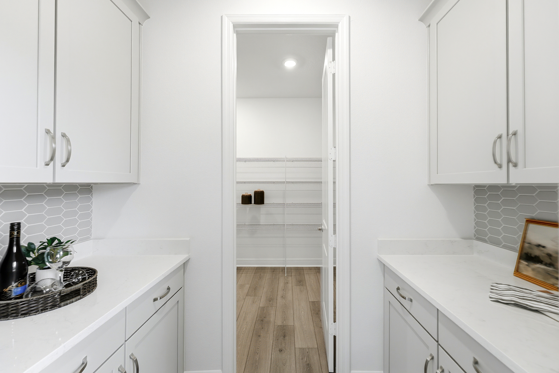 butler pantry with access to the walk-in pantry