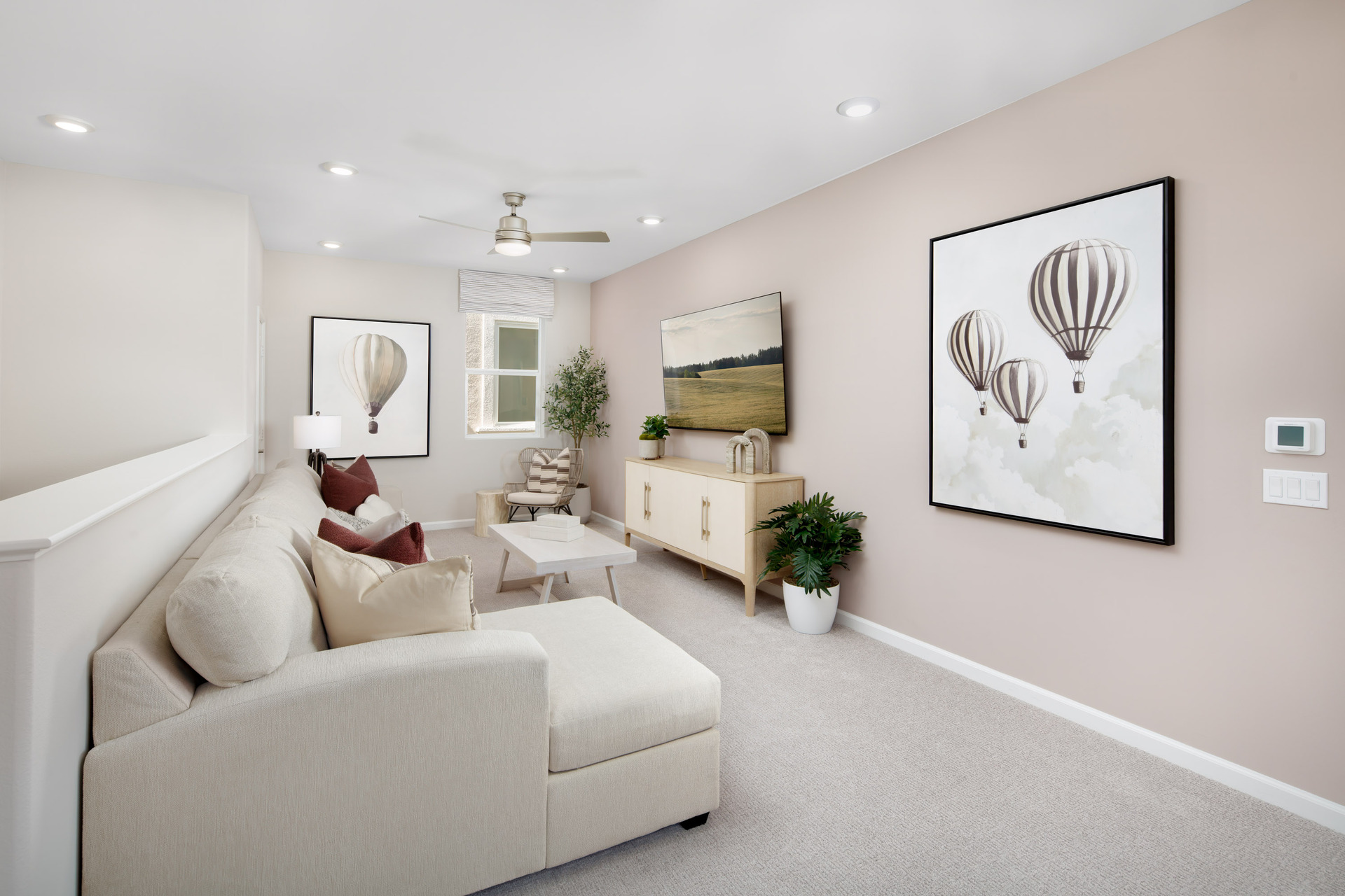 loft with neutral carpet near bedrooms