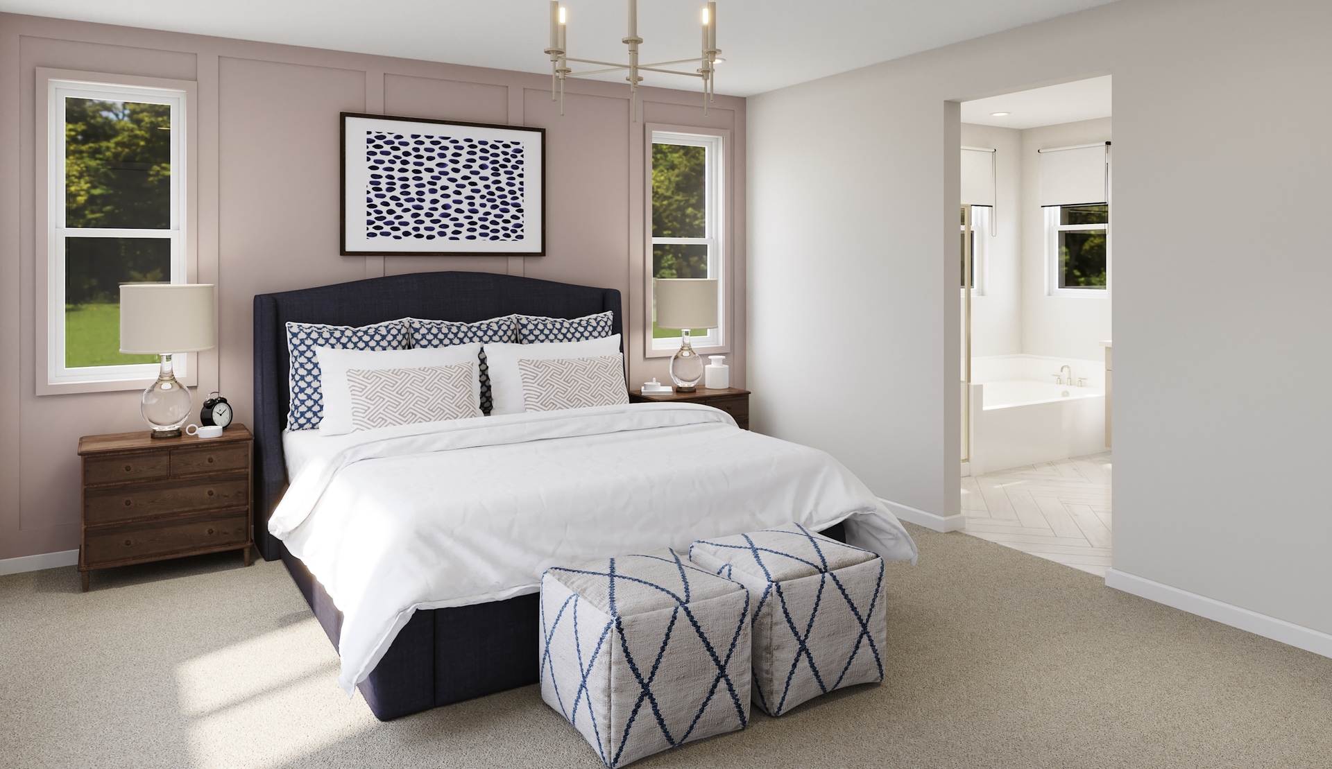 primary bedroom with neutral carpet and large windows