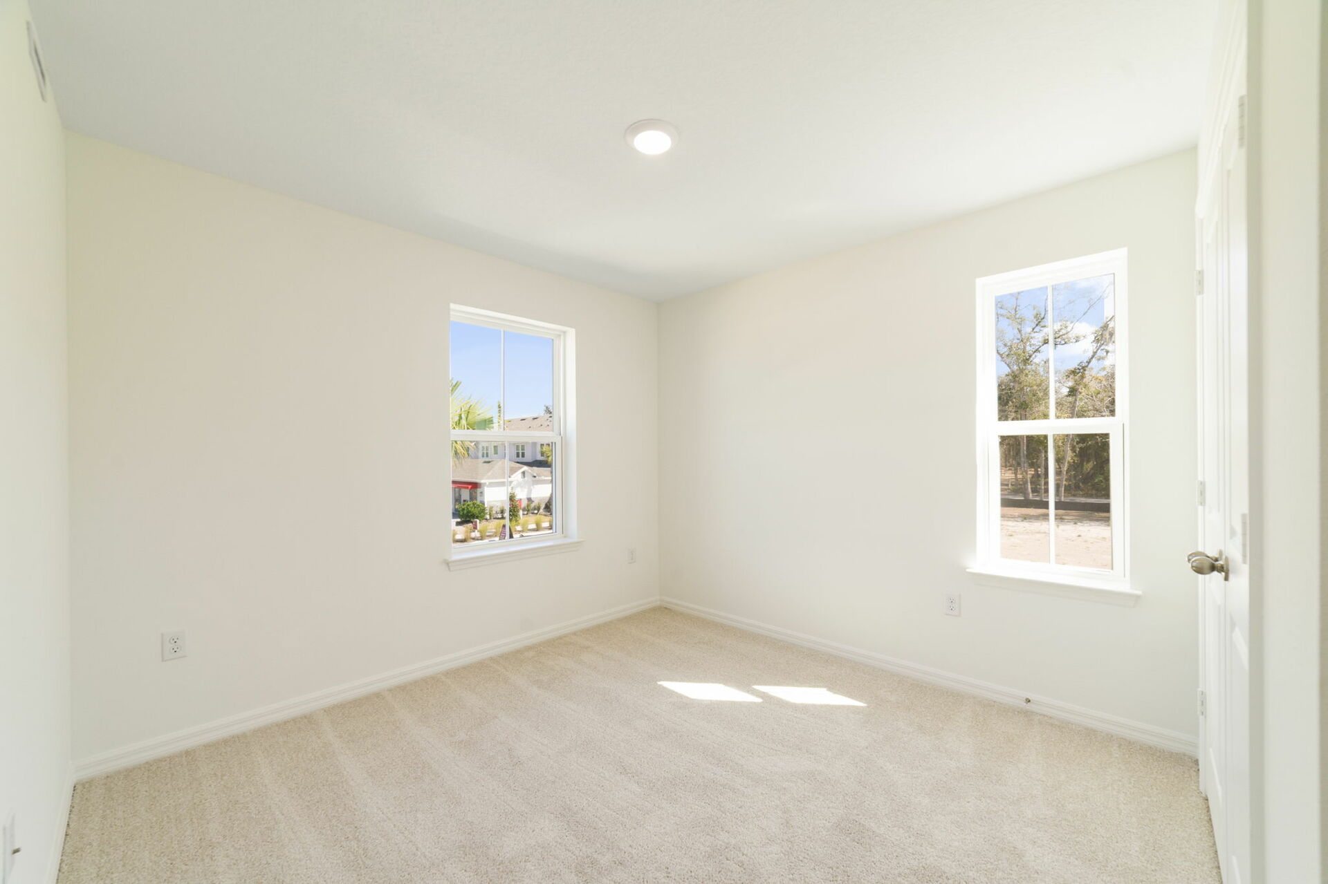 room with carpet throughout, single window and access to the closet