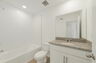 single sink vanity, water closet and tub