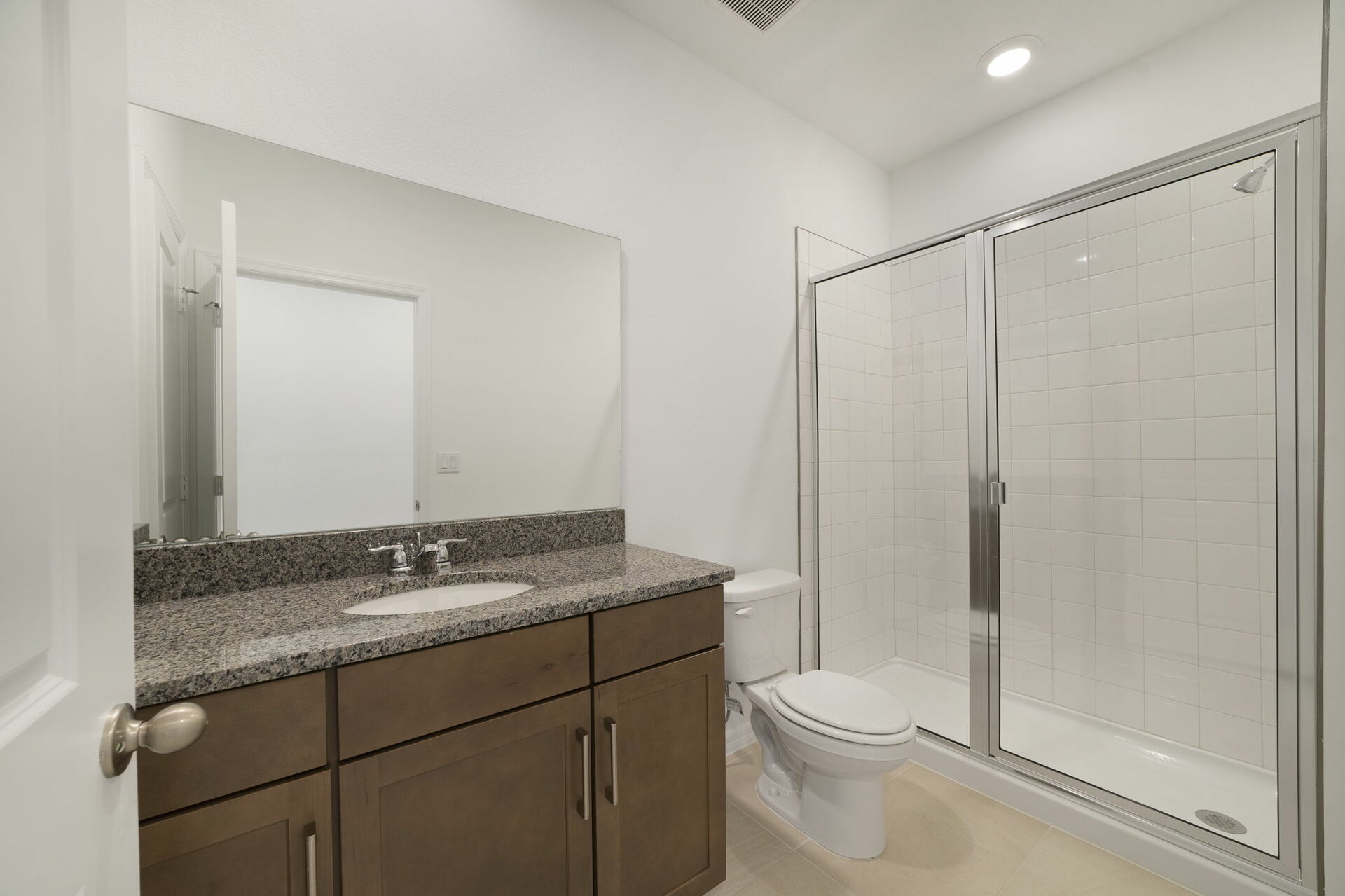 single sink vanity with water closet and tub