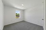 carpet throughout with a single window and closet
