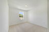 room with carpet throughout and single window