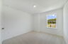 carpet throughout and single window