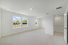 room with carpet throughout and view of sitting room