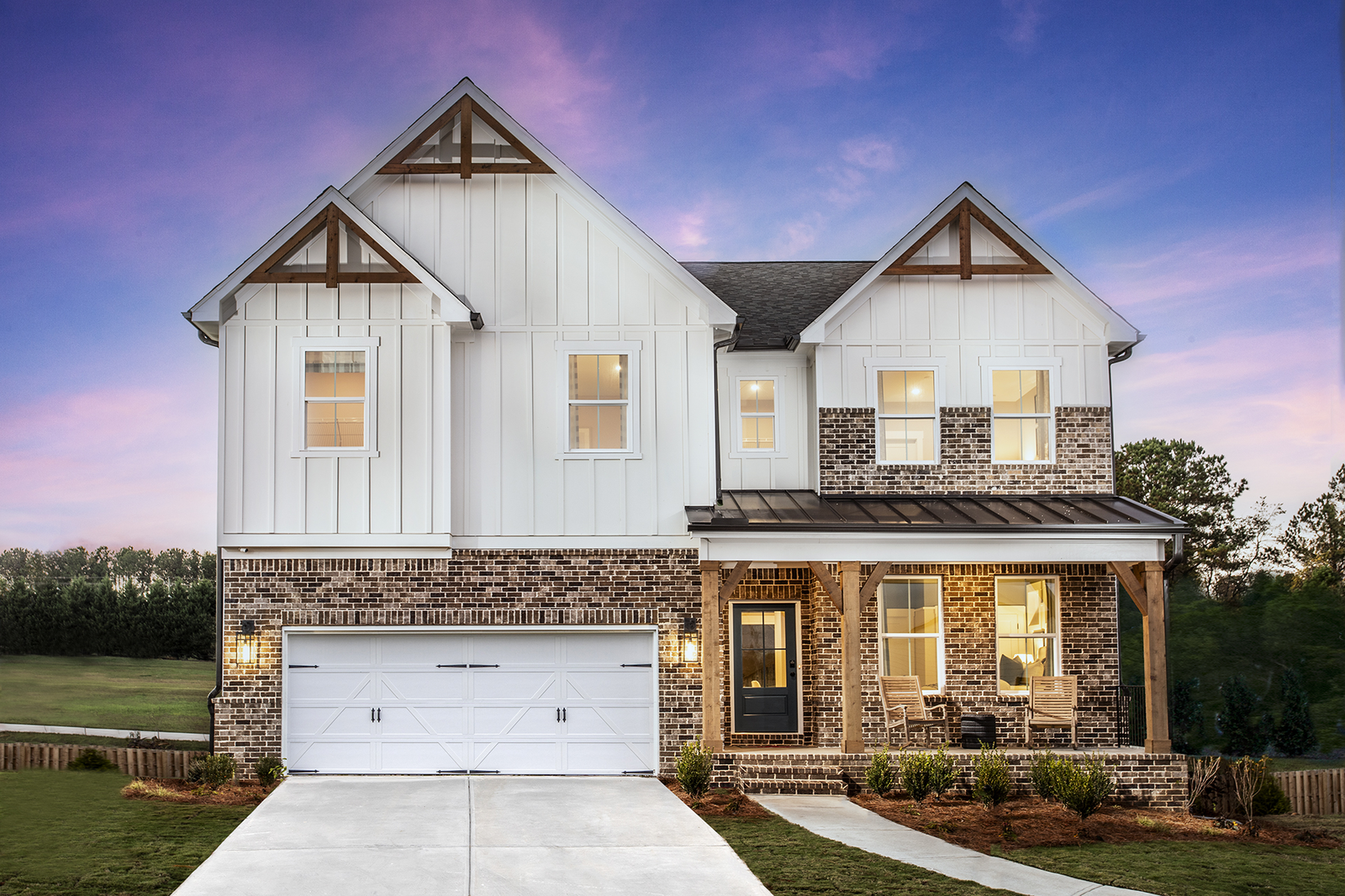 front of home with brick and wood details 