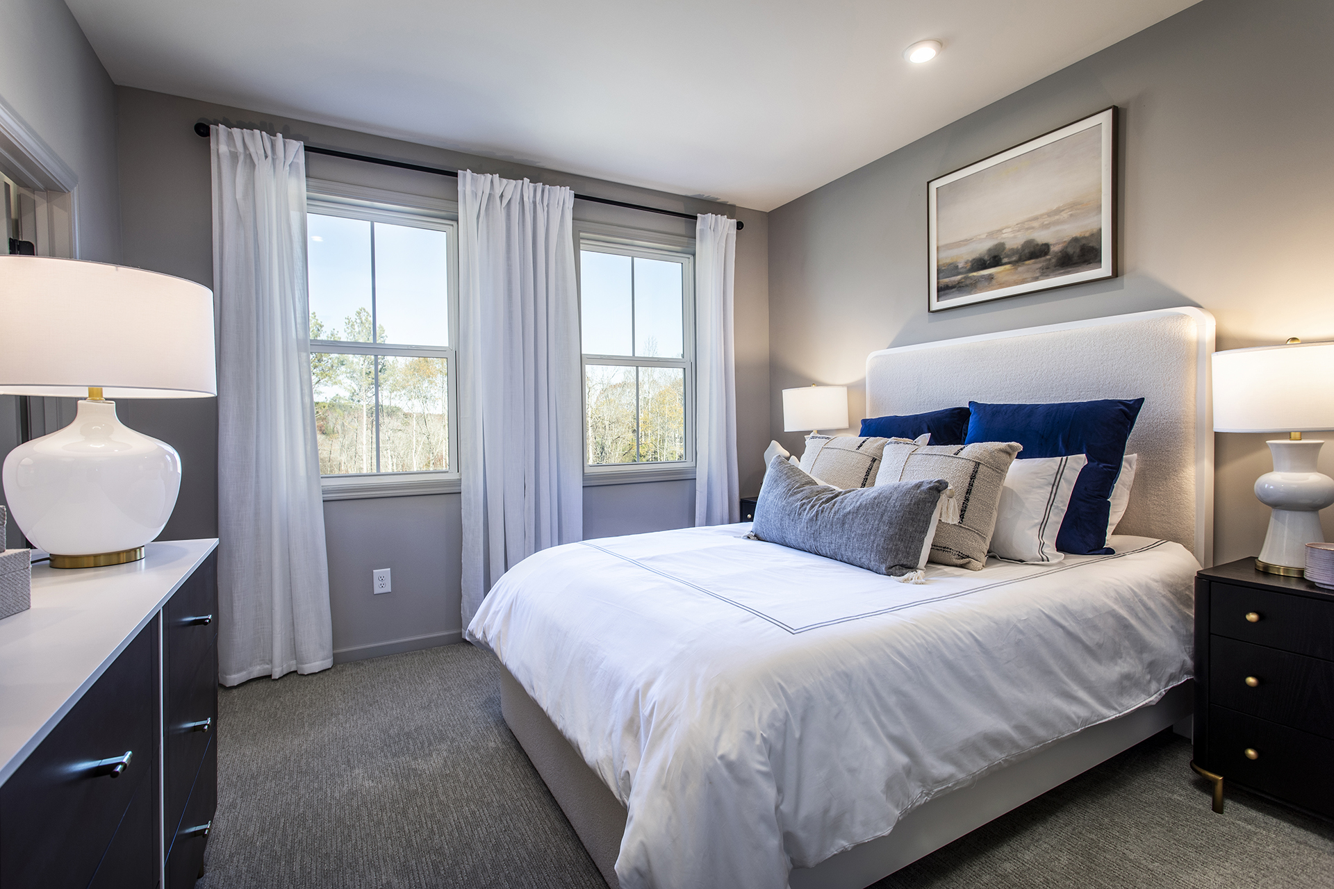 bedroom with carpet and windows