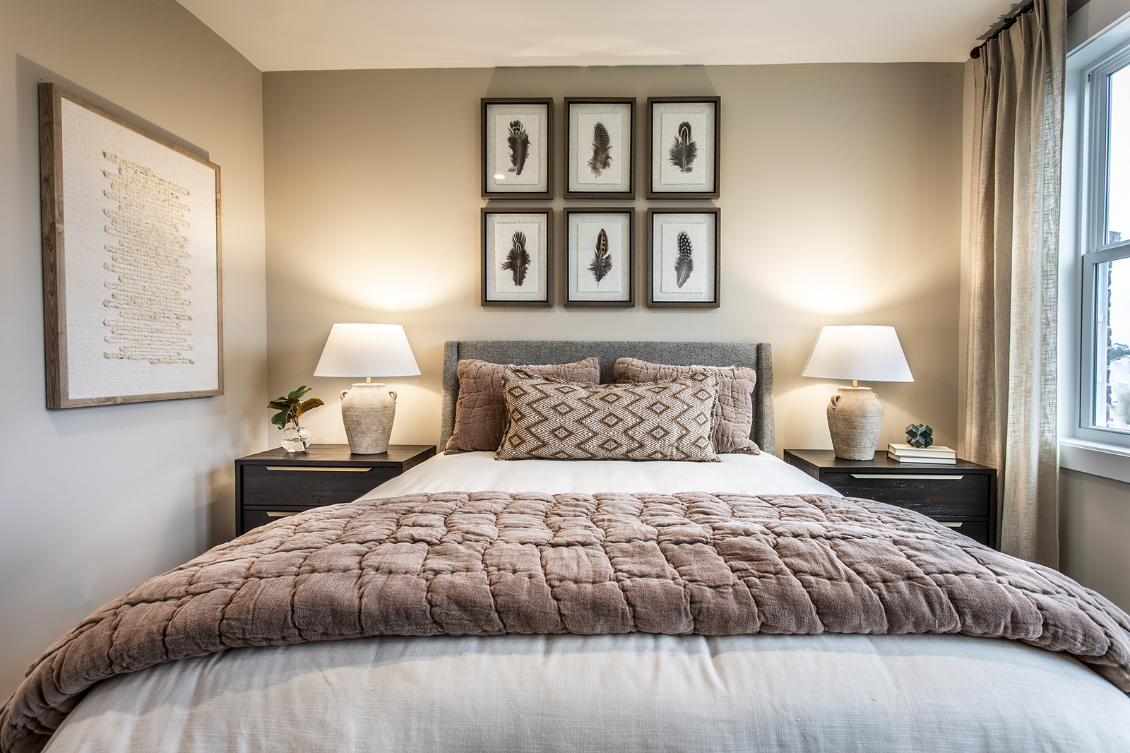 secondary bedroom with queen bed & side tables