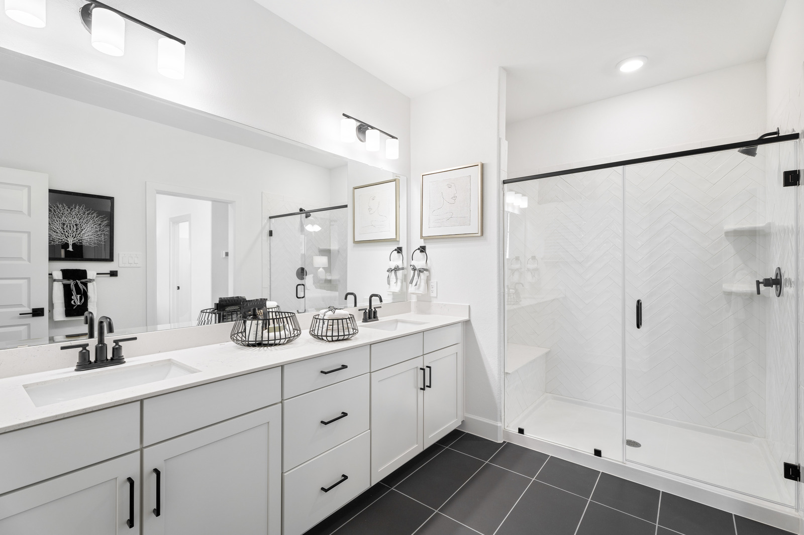 primary bathroom with white countertops