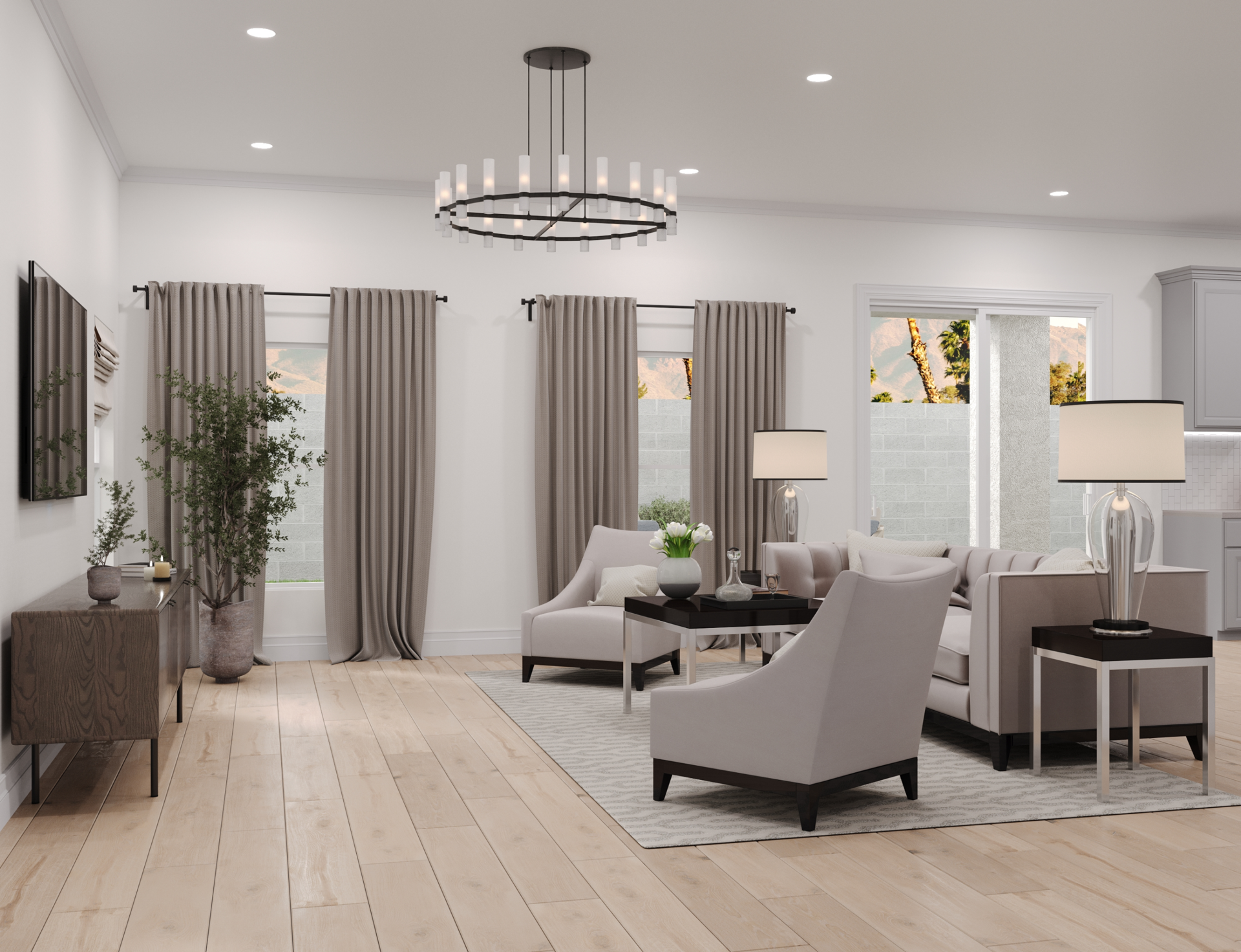 open-concept room with grey couch and grey chairs