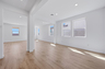 open-concept dining space with wood-like flooring and recessed lighting
