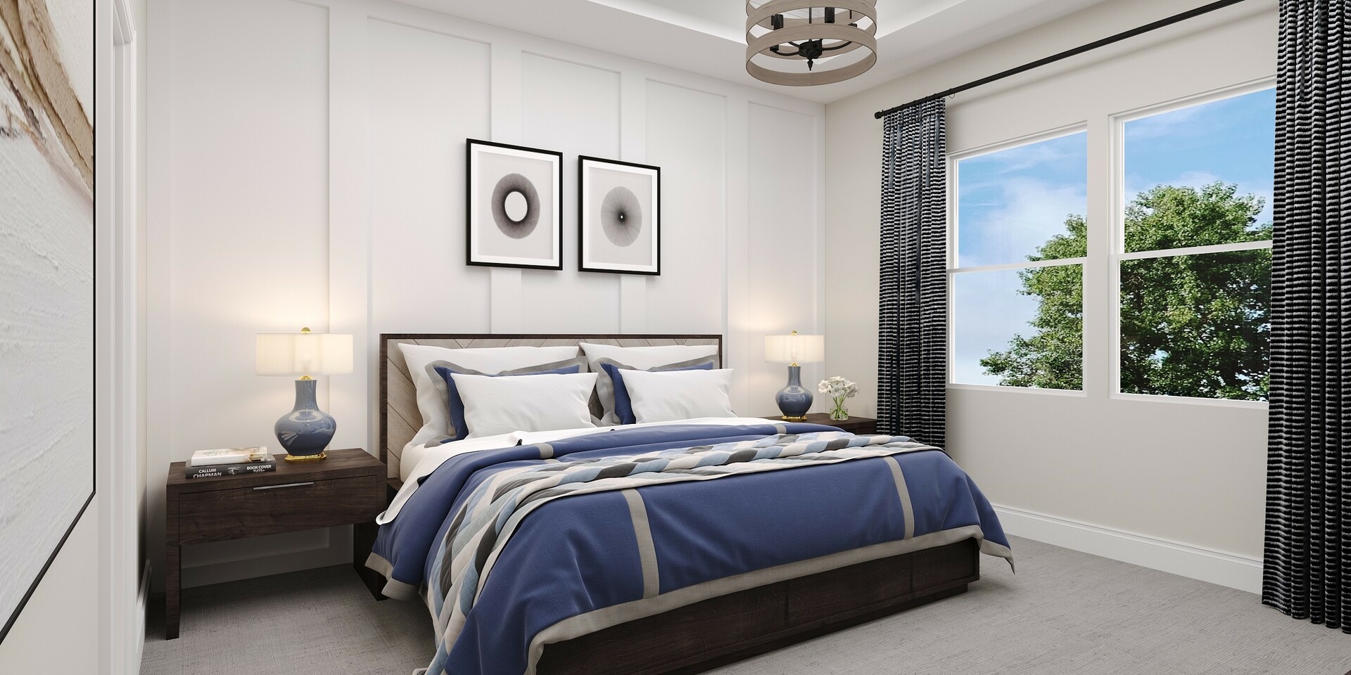 bedroom with white accent wall and bed with blue comforter