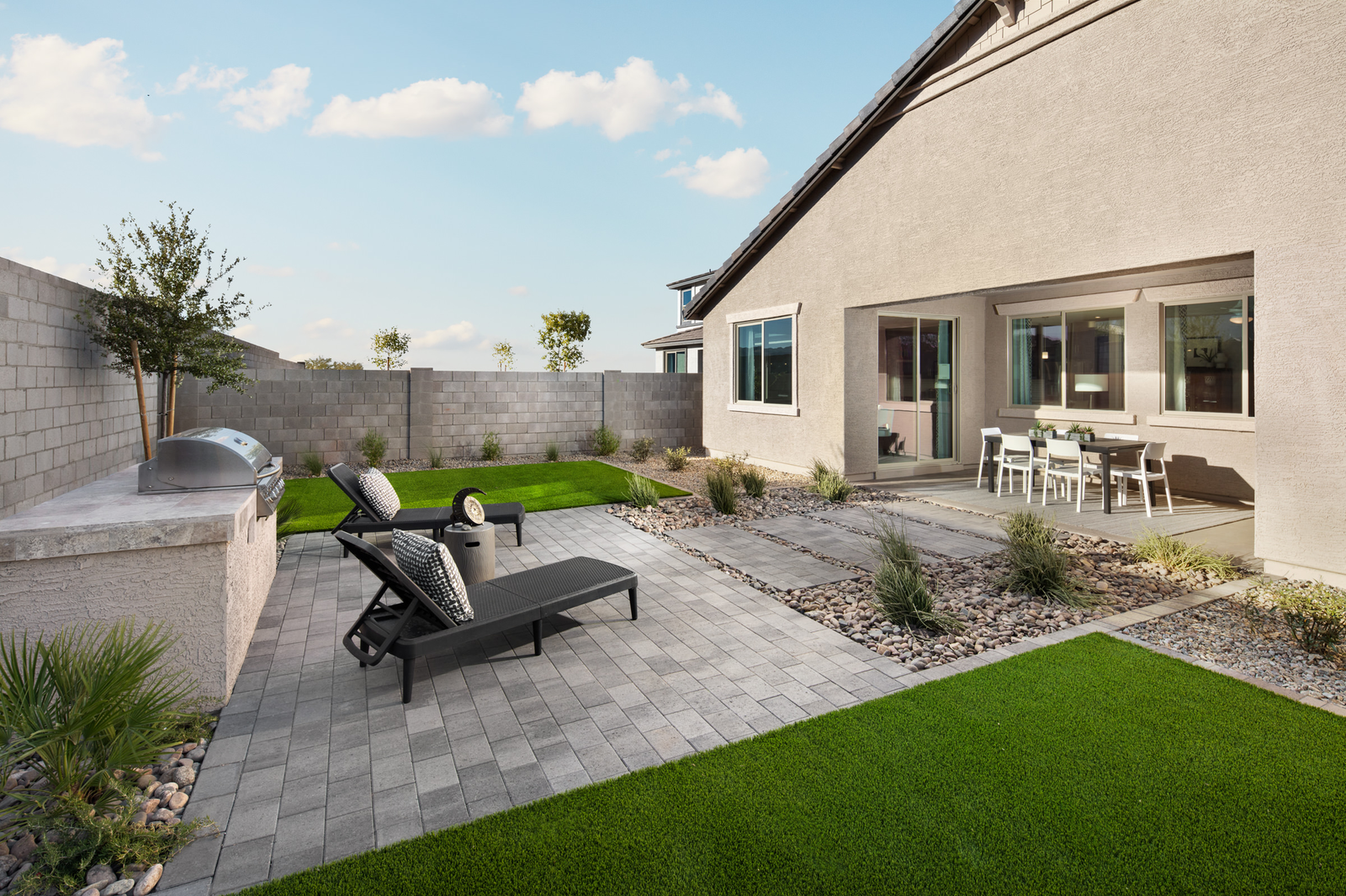 spacious backyard with patio furniture