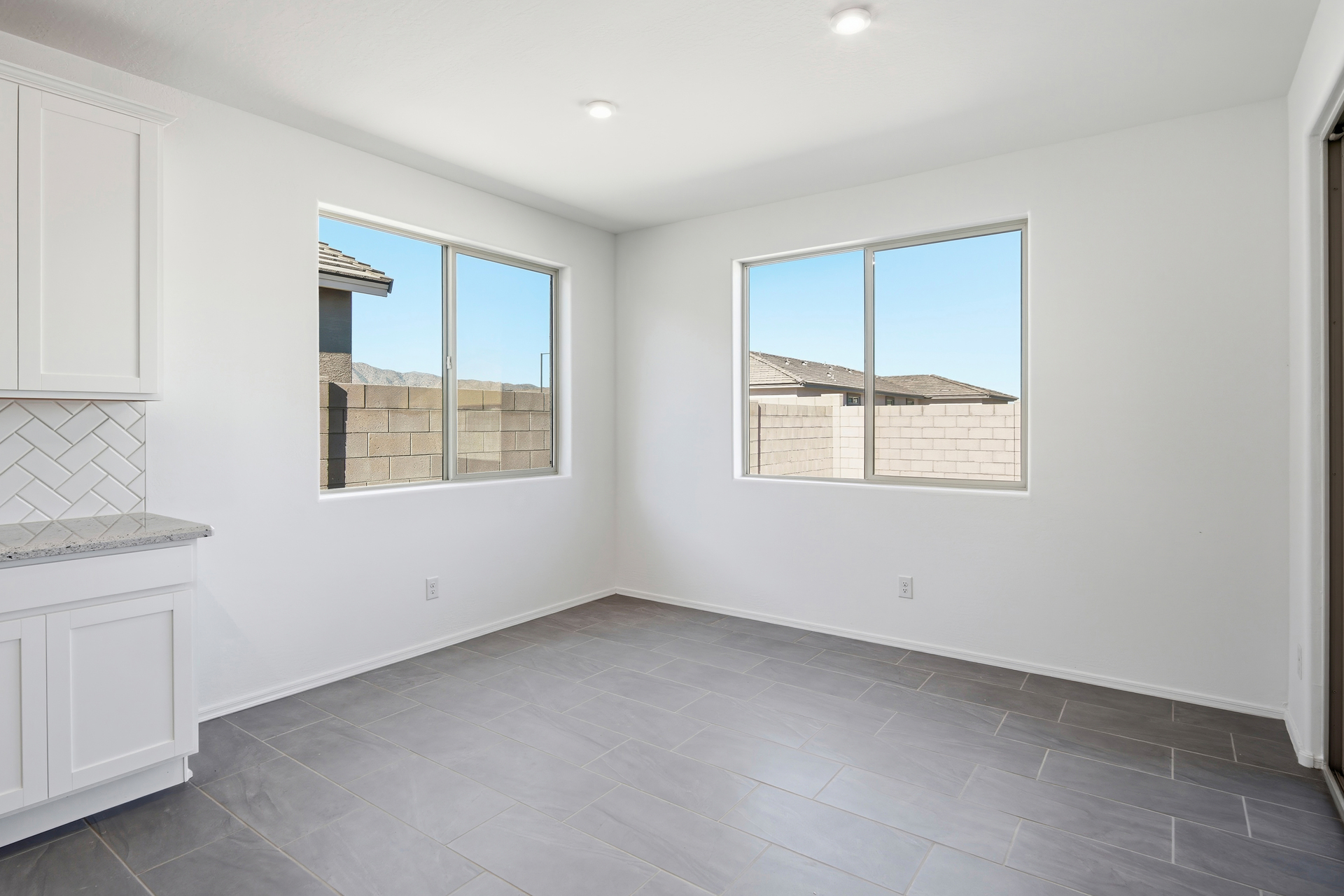 spacious dining space with plenty of natural light
