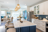 kitchen extending to the great room with designer flooring