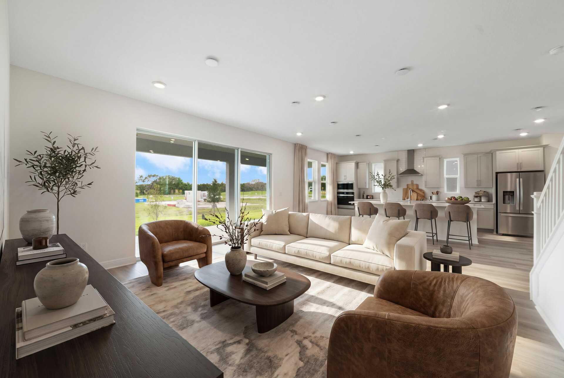 great room with view of kitchen and access to the lanai