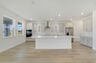 center island kitchen with view of the great room