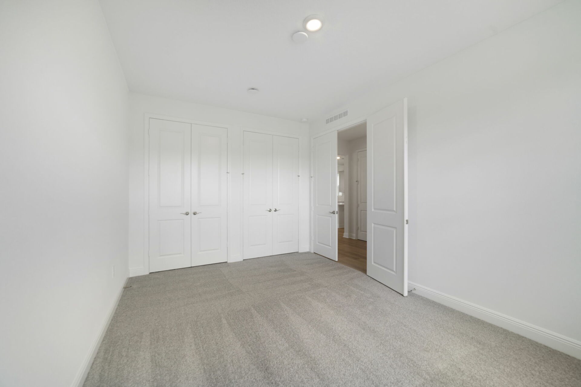 study room with carpet and closet