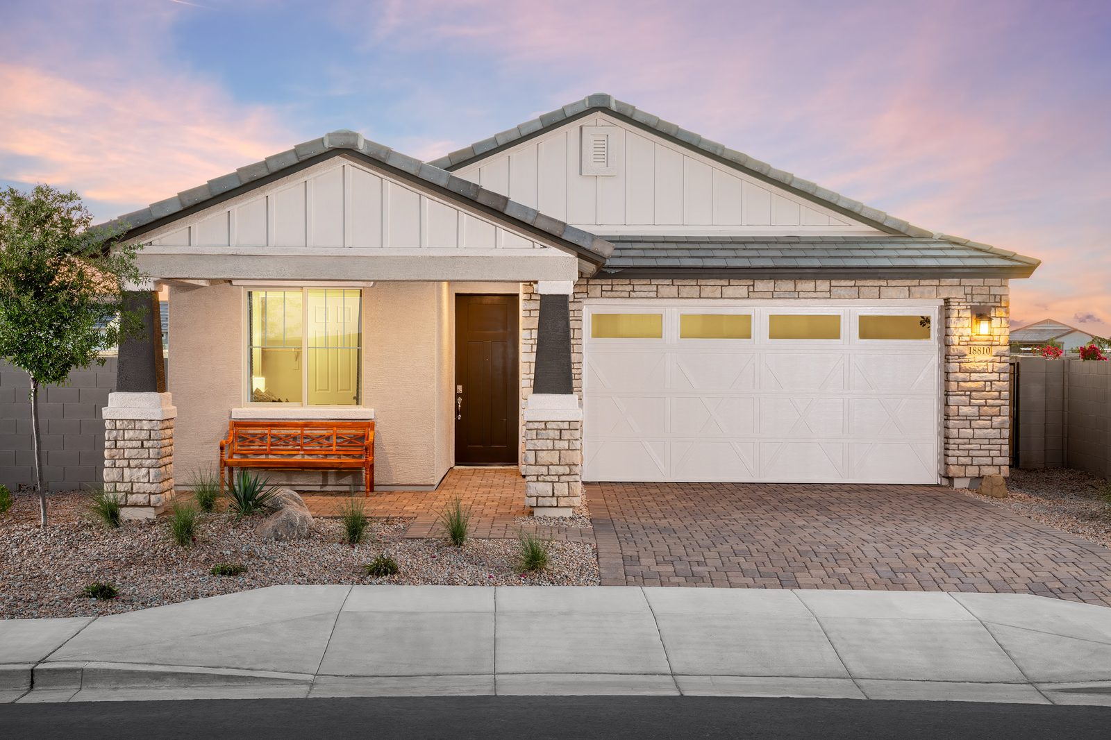 single-story home with desert landscaping