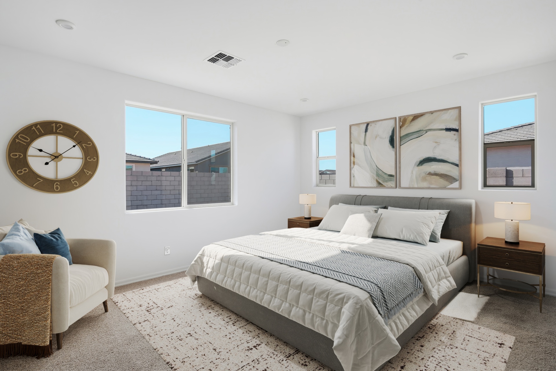 spacious bedroom with large bed and wooden nightstands