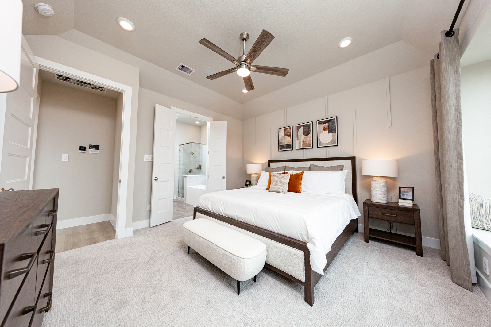 bedroom with beige carpet flooring and ceiling fan