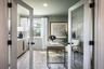 study with french doors and office space