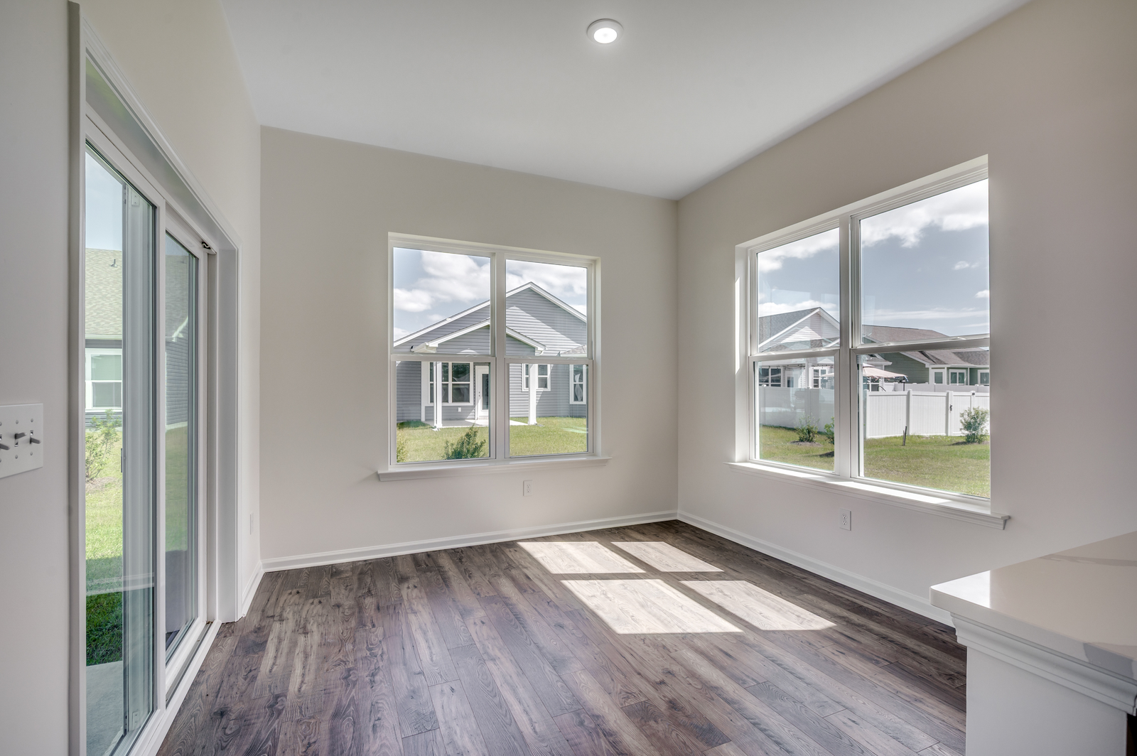 additional space with large windows and sliding glass door for natural lighting