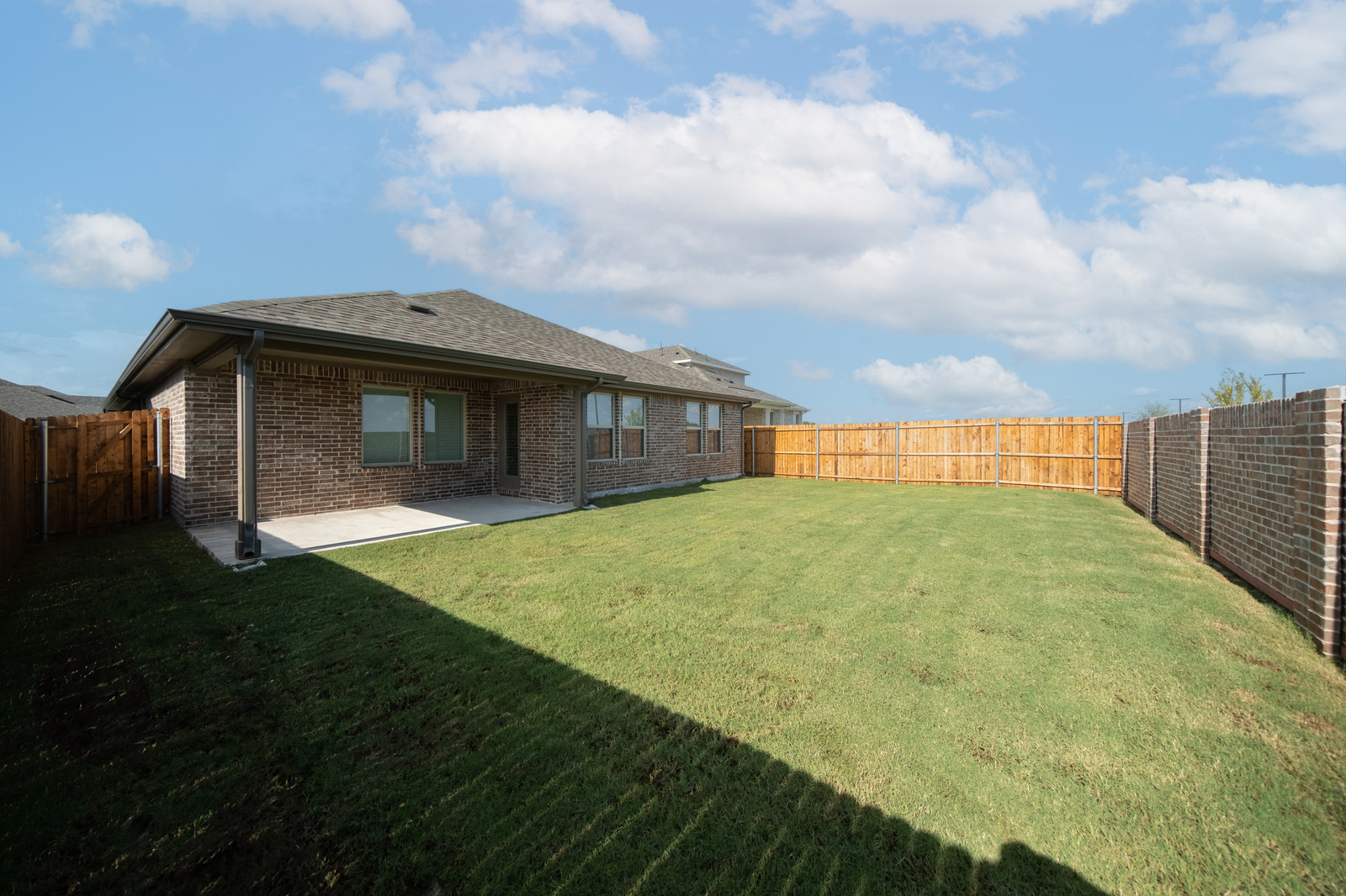 backyard of home with covered patio