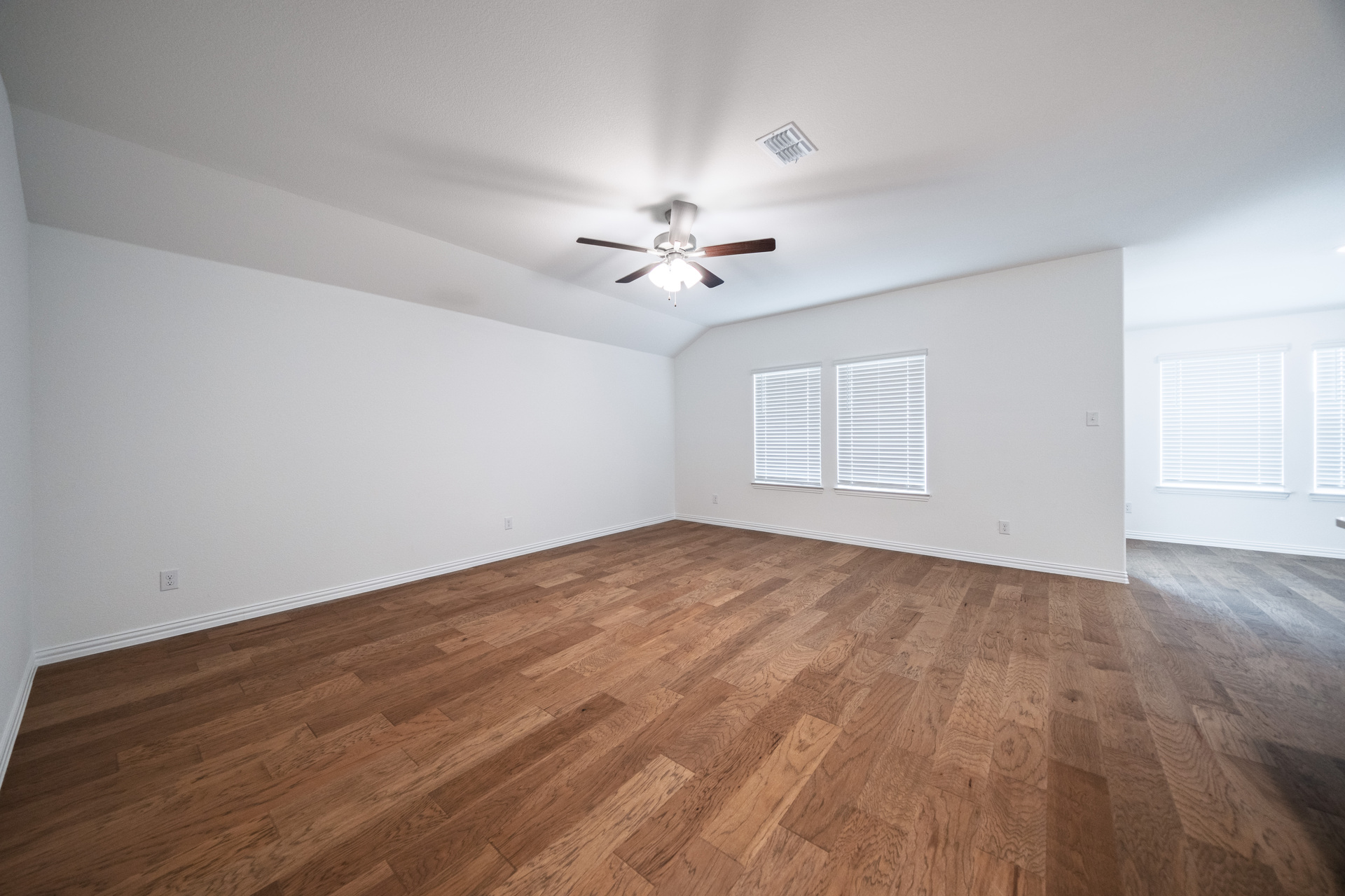 open great room with hardwood flooring