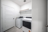 laundry room with included washer and dryer