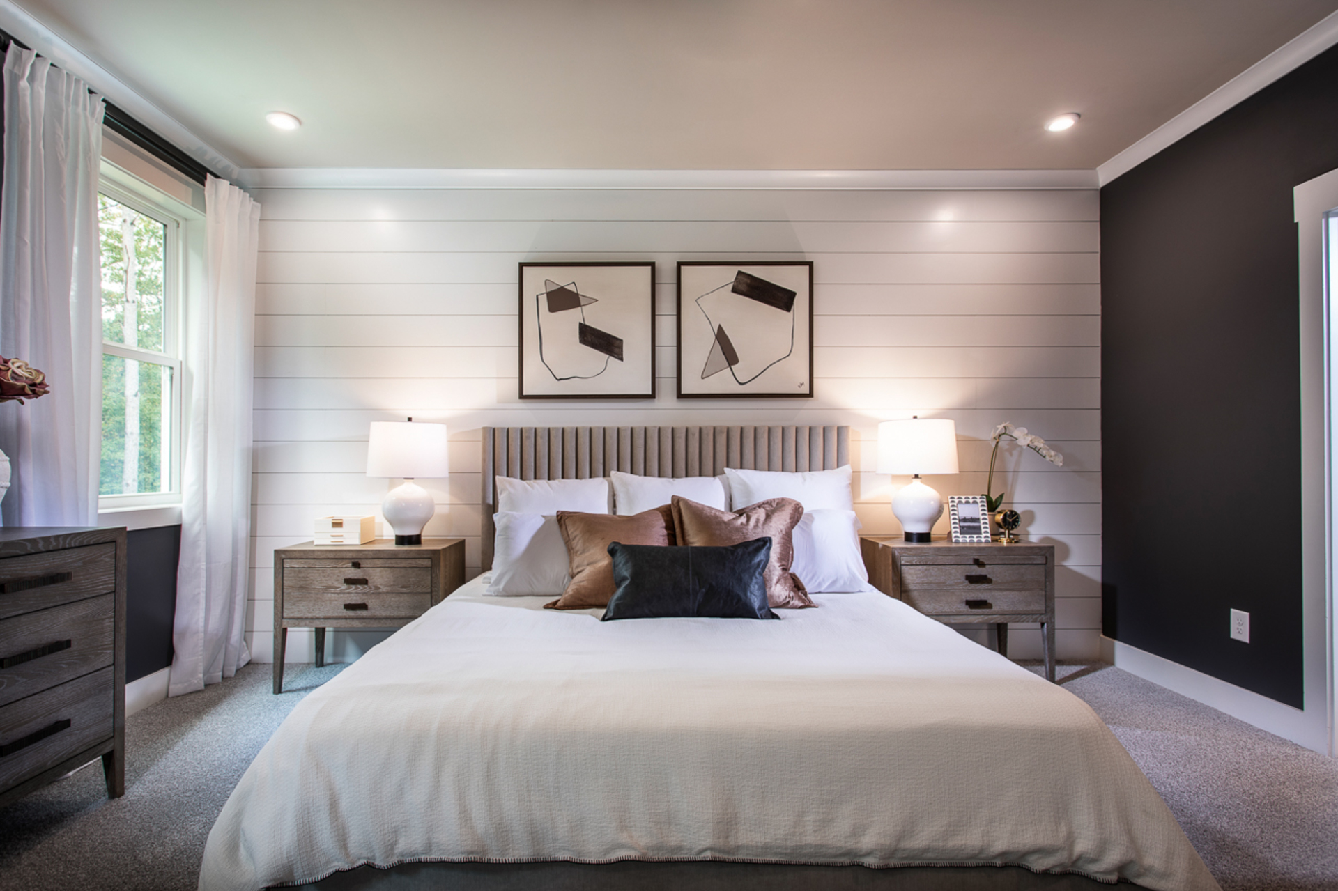 primary bedroom with carpet and en-suite bathroom