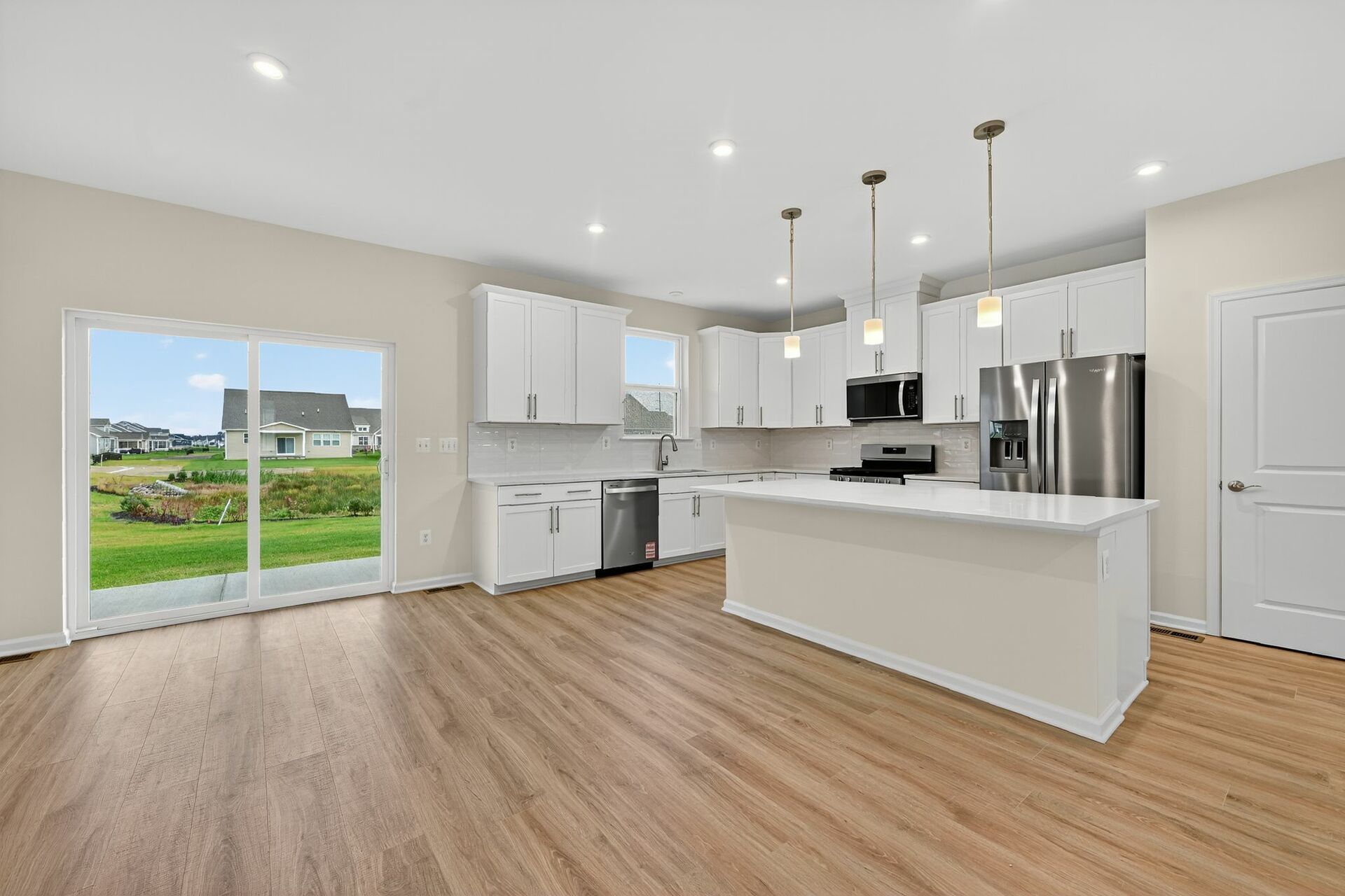 kitchen with a center island overlooking the breakfast area