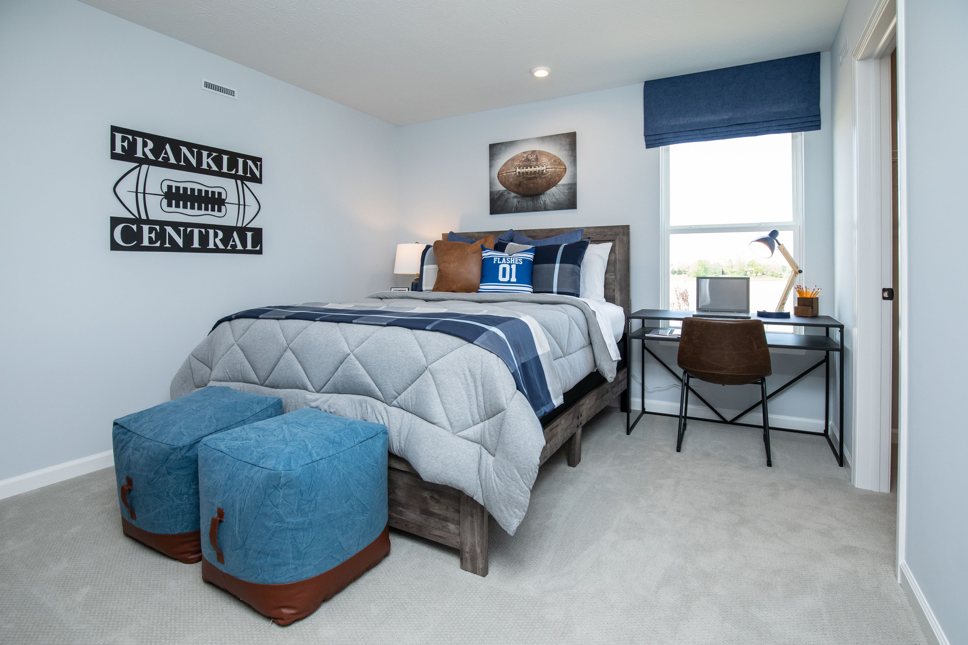 spacious guest room on the main floor with window