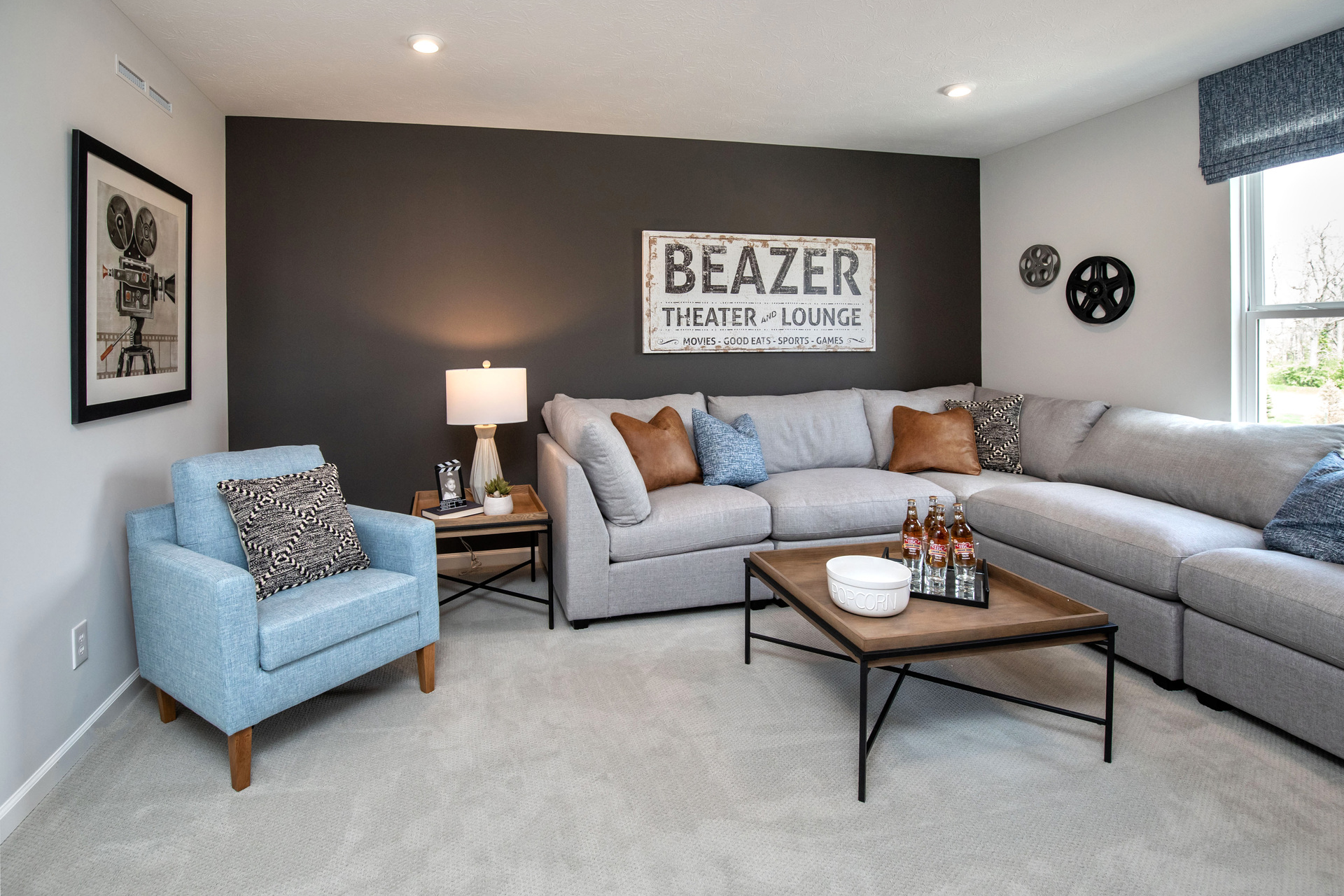 spacious loft on second floor with windows