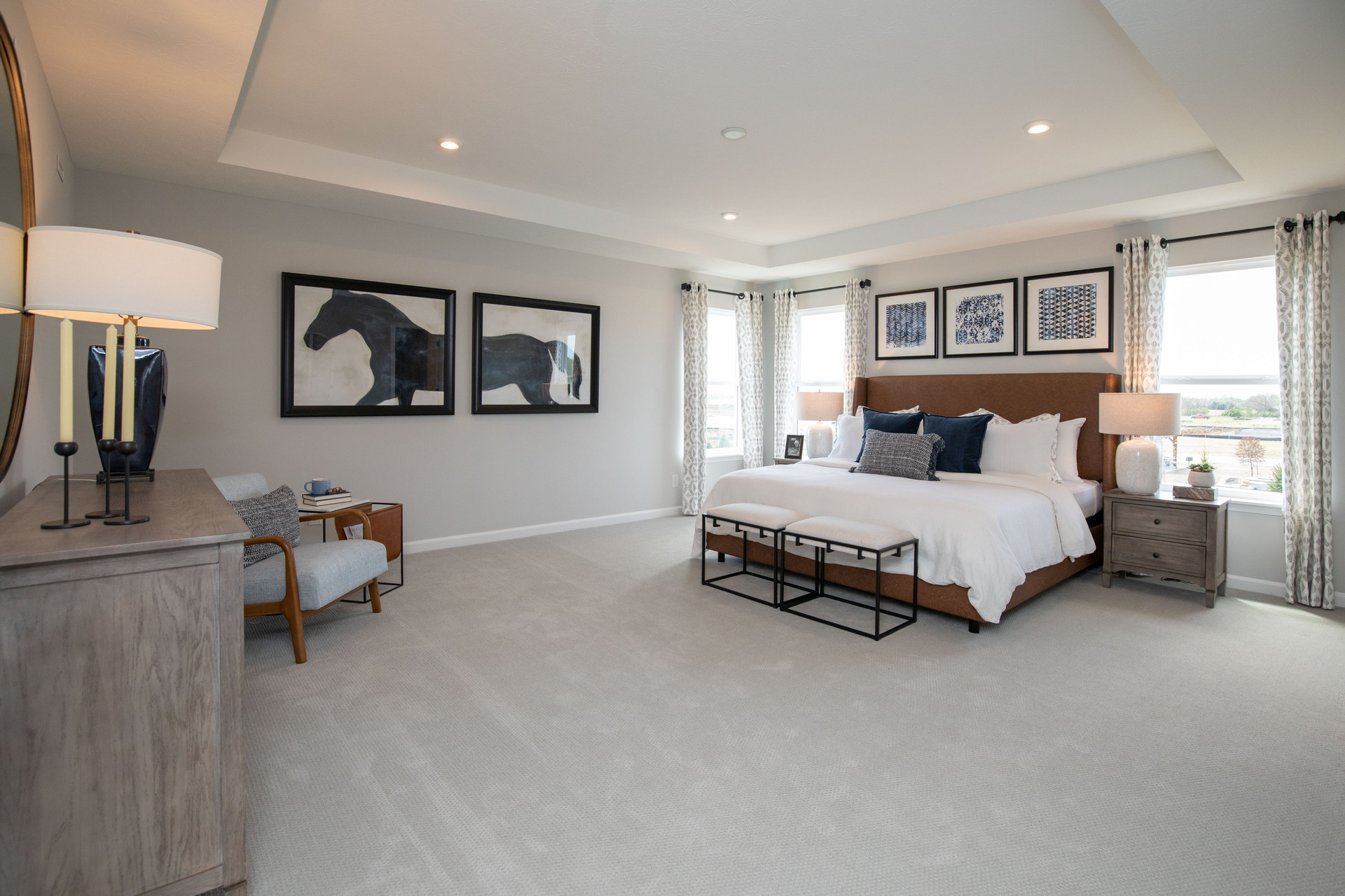 primary bedroom with tray ceiling 