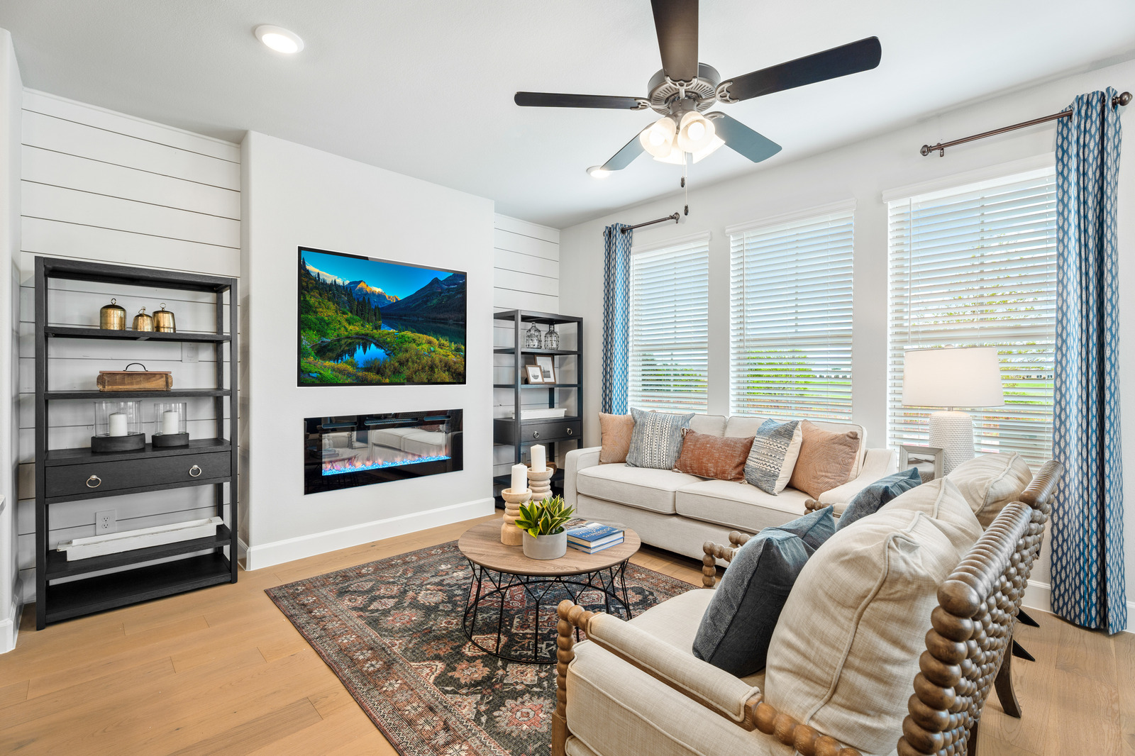 great room with large windows and natural light