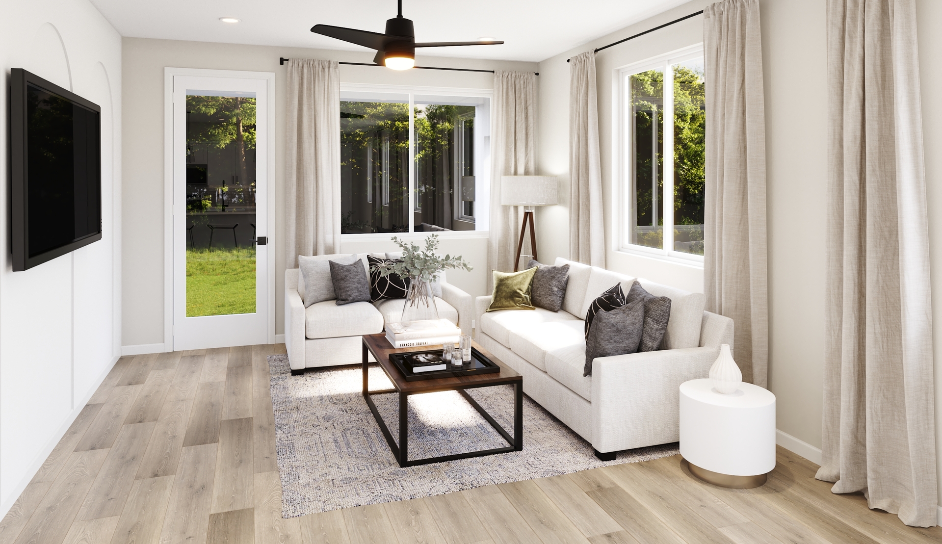 great room with large windows and neutral floors